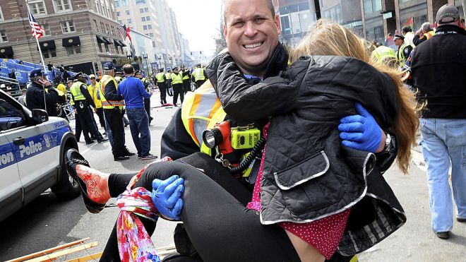 Boston Firefighter James Plourde carries an injured girl away from the scene after a bombing near the finish line of the Boston Marathon in Boston. (AP Photo/MetroWest Daily News, Ken McGagh, File) (METROWEST DAILY NEW2013) Read more: http://latino.foxnews.com/latino/health/2013/04/18/boston-marathon-bombings-prove-tourniquet-is-lifesaver/#ixzz2QwHeqwDW